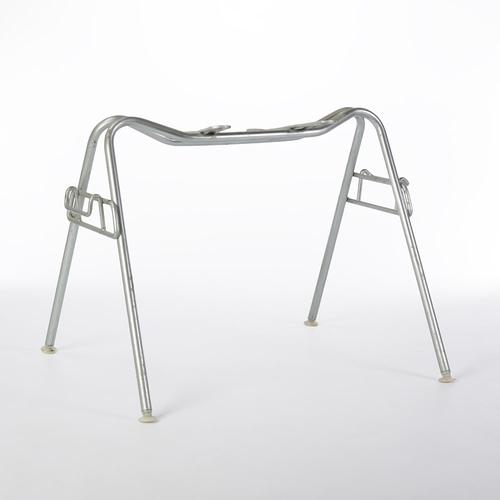Angled front view of vintage DSS base for Eames side shells