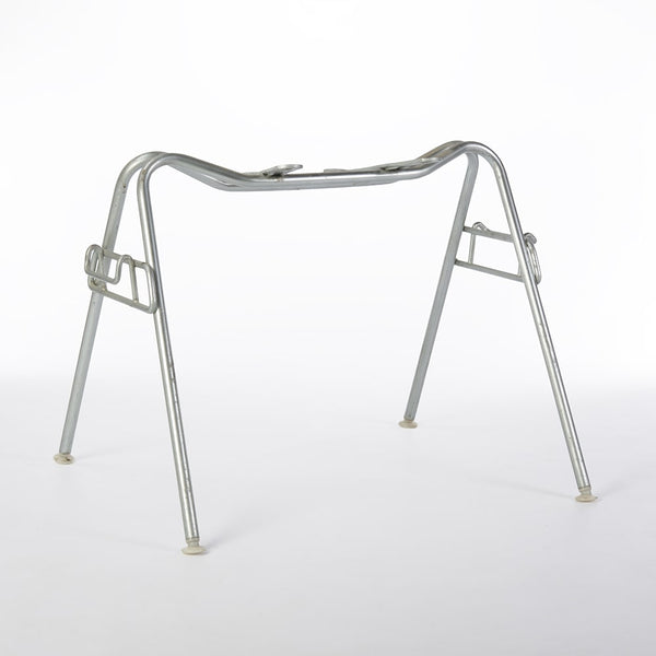 Angled front view of vintage DSS base for Eames side shells