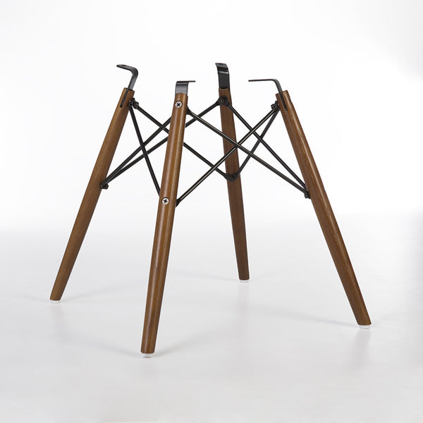Angled rear view of Light Oak dowel base for Eames side and arm shells