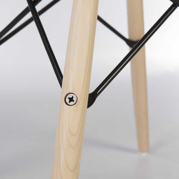 Close up view of Maple dowel base for Eames side and arm shells