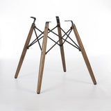 Rear angled view of Walnut Eames Dowel Base