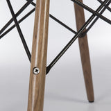 Close up of middle of Walnut Eames Dowel Base