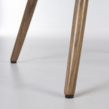 Close up of foot of Walnut Eames Dowel Base